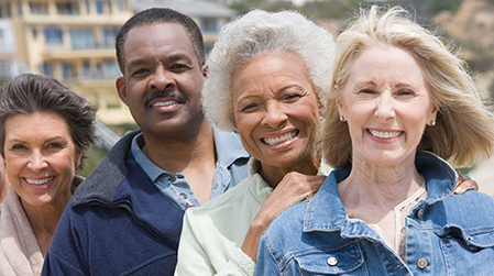 Diverse senior citizen smiling